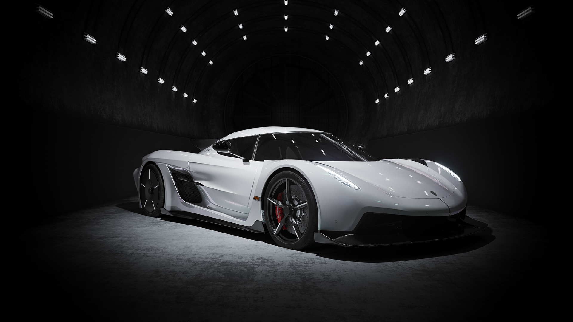 White luxury sports car displayed in a showroom