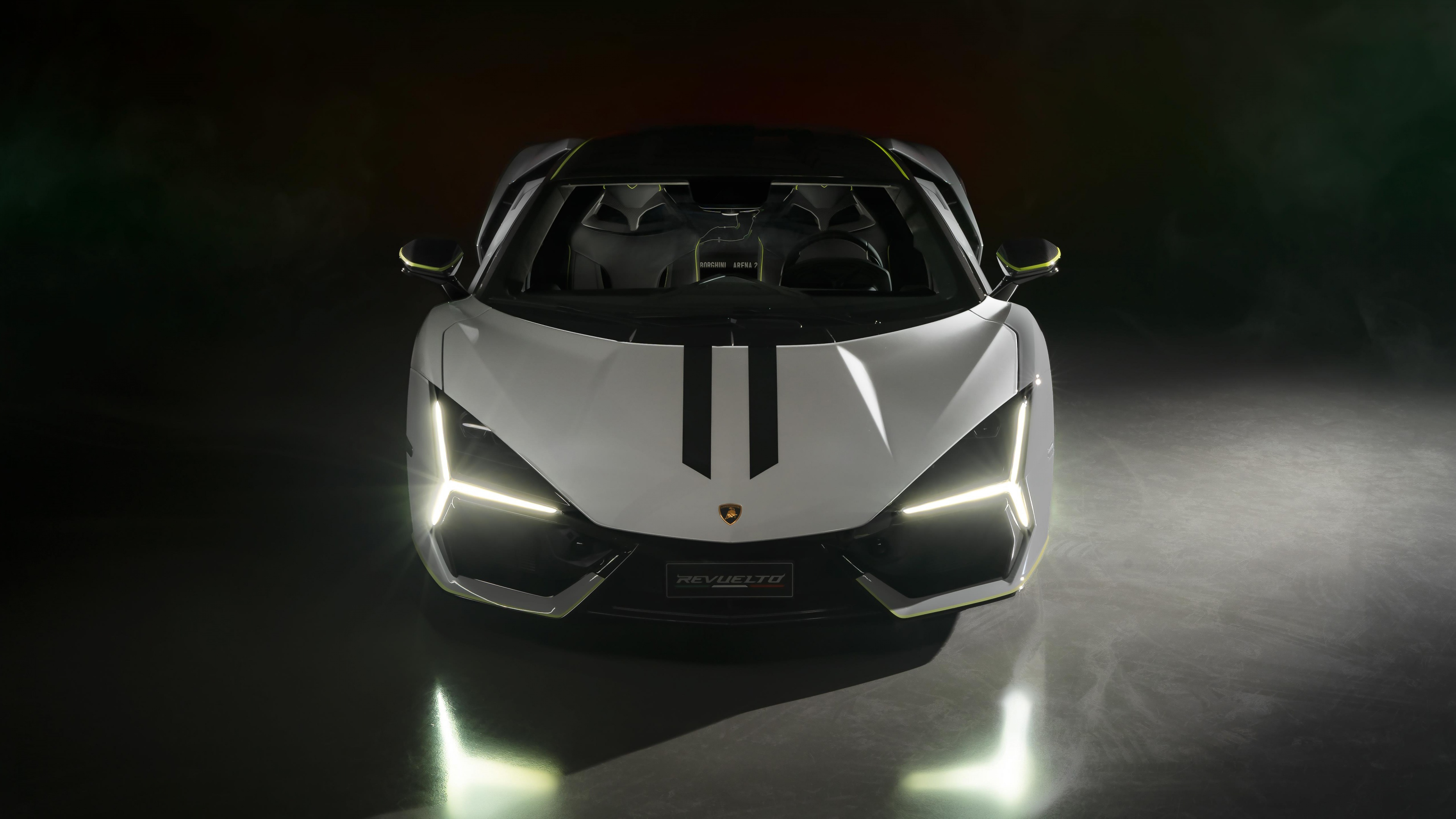 White luxury sports car displayed in a showroom